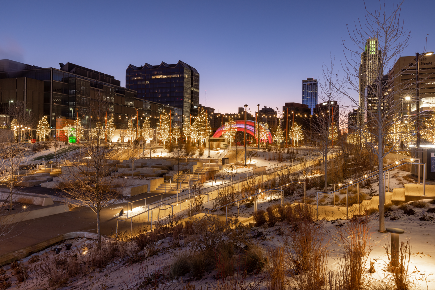 Christmas lights decorate the trees surrounding The RiverFront in Omaha.