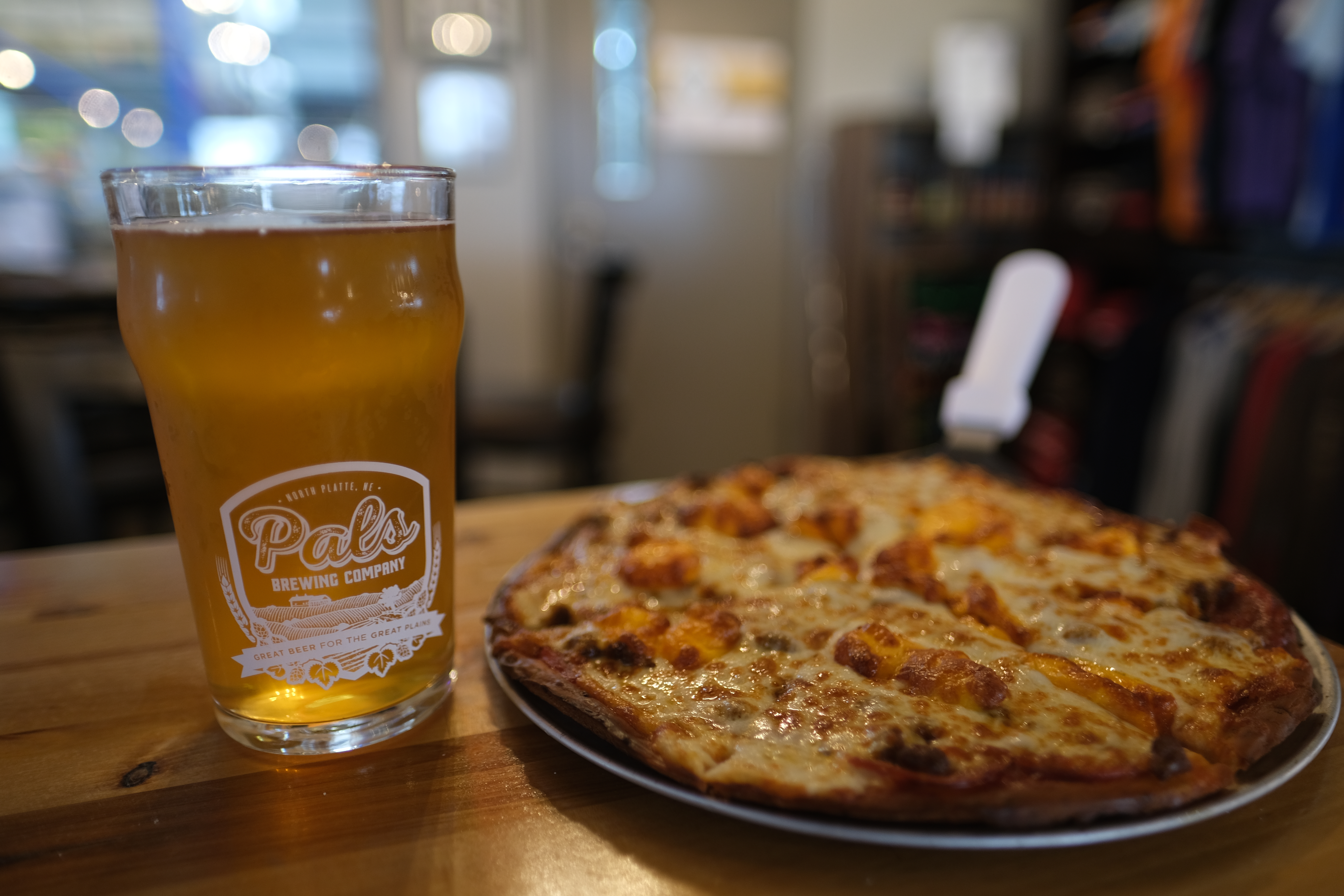 Pizza and a pint of beer at Pals Brewing Company.