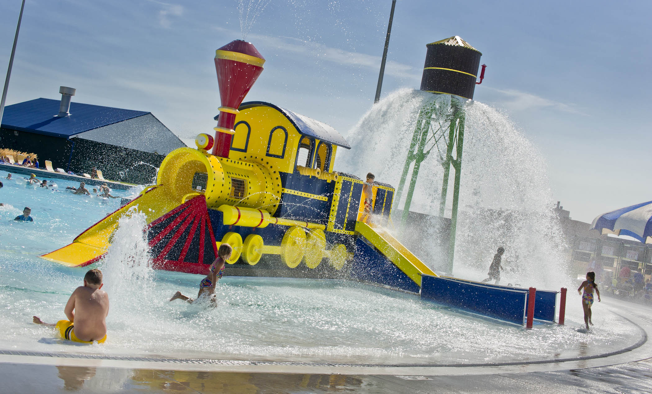 At Splash Station in Fremont, Nebraska, a train-theme water playground and water tower delights children.