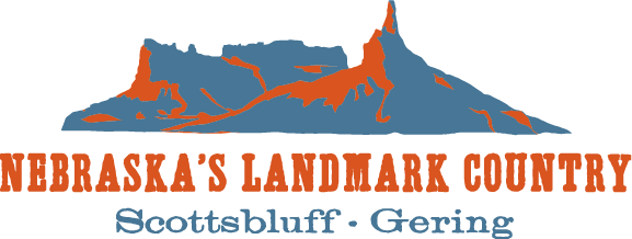 Scotts Bluff County Area Visitors Bureau logo with an illustration of Scotts Bluff National Monument and Chimney Rock that reads below it: "Nebraska's Landmark Country" "Scottsbluff" "Gering" 