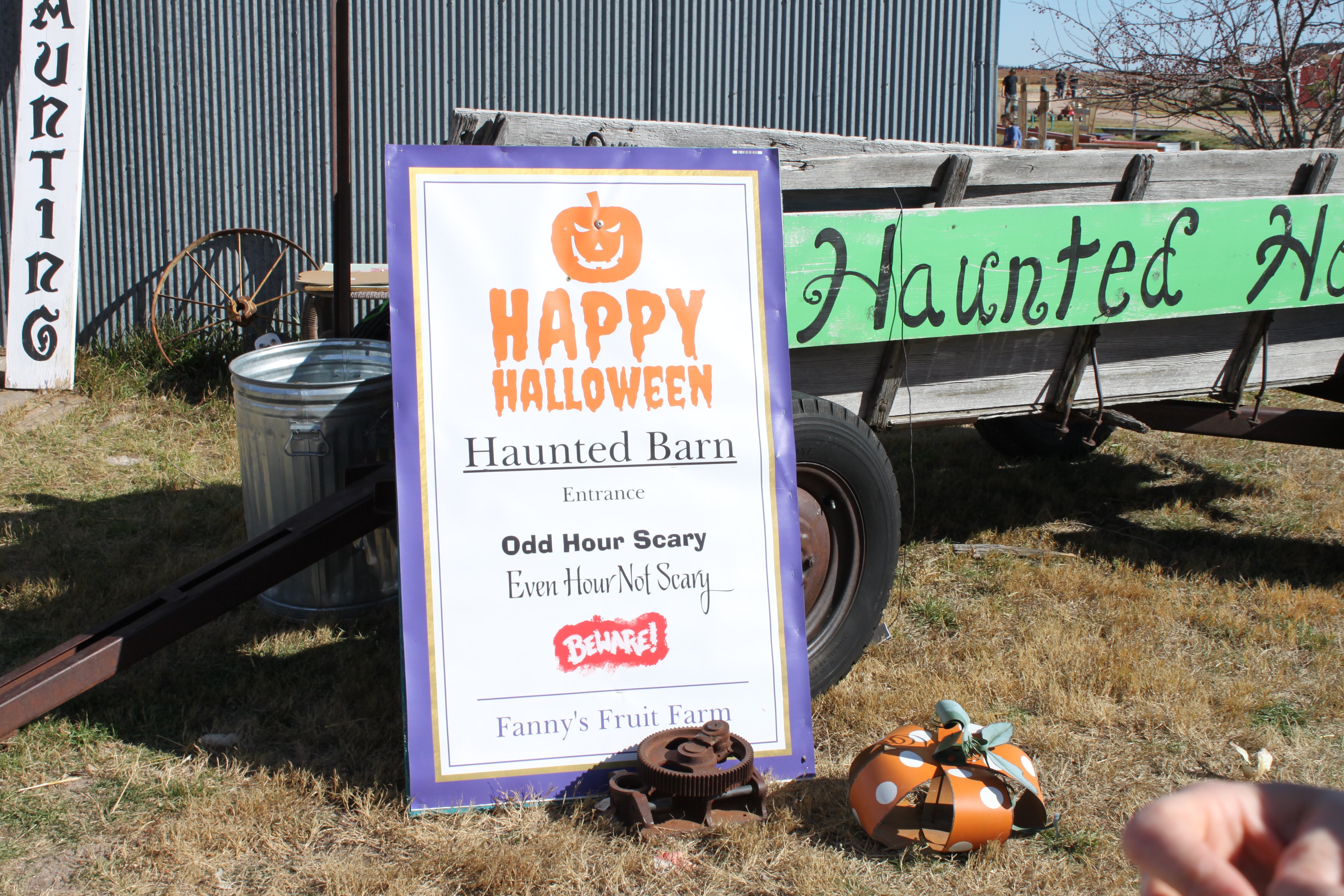 A "Happy Halloween Haunted Barn Entrance" sign that also says "Odd Hour Scary Even Hour Not Scary" atFanny's Fruit Farm and Pumpkin Patch in Gurley.