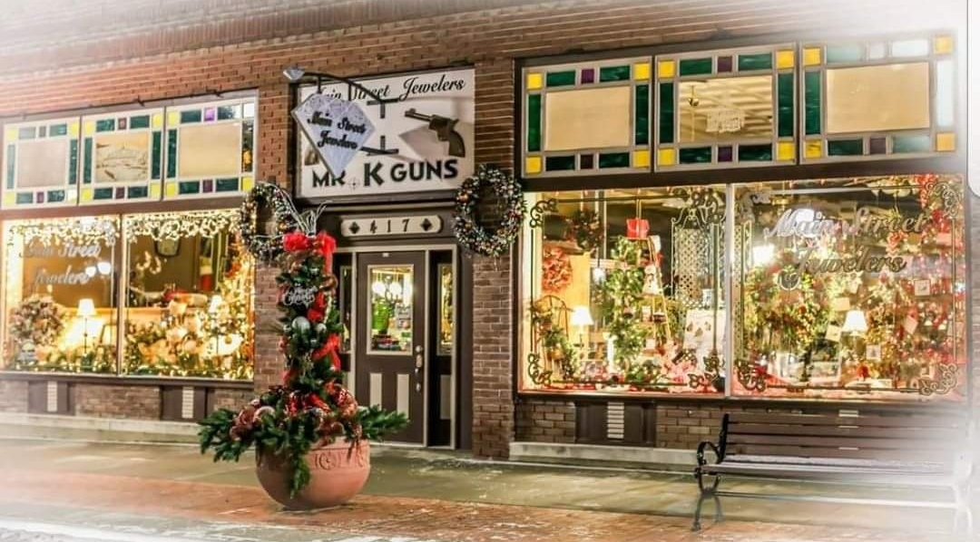 The storefront windows decorated with holiday displays at Main Street Jewelers.