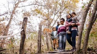 Family exploring Arbor Day Farm.