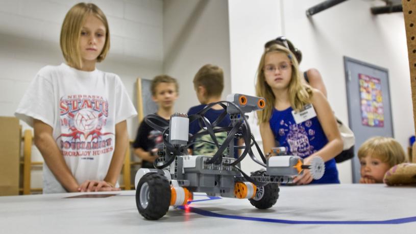 Children operating a hands-on science display at Edgerton Explorit Center.